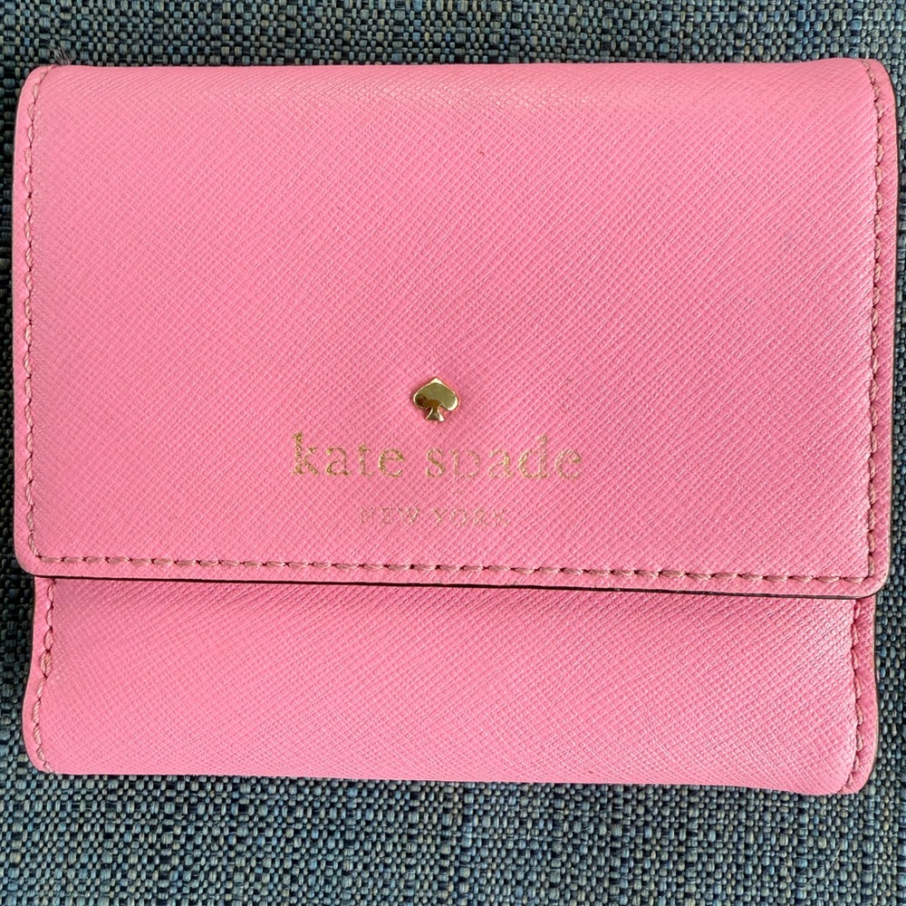 Kate Spade Vibrant Pink wallet. Looks new.